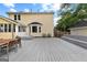 Backyard features a spacious deck and attached sunroom and has a view of the pool at 135 Cherokee Pl, Fayetteville, GA 30215