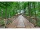 Scenic view of the private wooden driveway leading to a beautifully secluded home at 4002 Joshua Ln, Douglasville, GA 30135