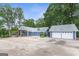 Desirable home features an attached garage and a large, inviting outdoor space at 4002 Joshua Ln, Douglasville, GA 30135