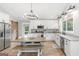 Gorgeous kitchen with stainless appliances, plenty of storage, and an island with a breakfast bar at 4002 Joshua Ln, Douglasville, GA 30135