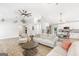 Bright living room and kitchen area features modern decor and lots of seating at 4002 Joshua Ln, Douglasville, GA 30135