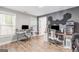 Bright home office space featuring modern desks, chairs, and stylish decor with wood flooring at 4002 Joshua Ln, Douglasville, GA 30135