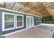 Inviting patio has wood floors, a modern design, and access to the interior of the home at 4002 Joshua Ln, Douglasville, GA 30135