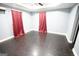 Spacious bedroom with gray walls and hardwood flooring at 3010 Waters Rd Sw, Atlanta, GA 30354