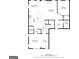 The first-floor plan features an open-concept kitchen, dining, and living area for easy flow and entertaining at 140 Canyons, Hampton, GA 30228