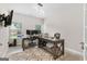 Bright office space featuring stylish lighting, two work stations, and a plush rug at 140 Canyons, Hampton, GA 30228