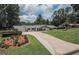 An aerial shot showcasing the home's manicured landscaping and serene setting at 410 Golf View Dr, Peachtree City, GA 30269
