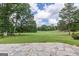 Stunning golf course views from the backyard patio with a stone base at 410 Golf View Dr, Peachtree City, GA 30269