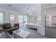 Serene bedroom with an inviting bed, sliding glass doors to a patio, and soothing, neutral decor at 410 Golf View Dr, Peachtree City, GA 30269