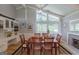 Dining room with custom built-in cabinets and views of backyard at 410 Golf View Dr, Peachtree City, GA 30269