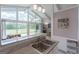 Bright kitchen with marble counter and stainless steel appliances offering natural light and golf course views at 410 Golf View Dr, Peachtree City, GA 30269