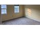 Bedroom with carpeted floors and bright natural light at 990 Hickory Bend Rd, Atlanta, GA 30349