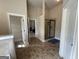 Bathroom featuring standing shower with glass doors and tile floor at 1141 Norsworthy Ml, Hampton, GA 30228