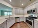 Bright kitchen with stainless steel appliances, granite countertops, and ample cabinet space at 3712 Upland Dr, Mcdonough, GA 30253