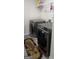 Laundry room with a full-size, modern, gray washer and dryer at 3750 Richmond Bnd, Lithonia, GA 30038