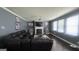 Comfortable living room with plush seating, a fireplace, and a large screen tv at 3750 Richmond Bnd, Lithonia, GA 30038