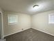 Neutral bedroom featuring carpeted floors and large windows providing ample natural light at 3403 Linda Dr, Lithia Springs, GA 30122