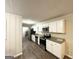 Updated kitchen with stainless steel appliances, granite countertops, and neutral-toned cabinets at 3403 Linda Dr, Lithia Springs, GA 30122