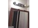 Bathroom view of vanity mirror and light fixture at 5420 Herndon Blvd, Morrow, GA 30260