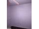 Bedroom with dark wood-look floor and ceiling fan at 5420 Herndon Blvd, Morrow, GA 30260