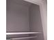 Interior view of a closet with a shelf and hanging rod, providing a functional storage space at 5420 Herndon Blvd, Morrow, GA 30260