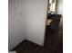 Shows the kitchen area next to the door, revealing the stove and cabinets at 5420 Herndon Blvd, Morrow, GA 30260