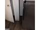 Stainless steel refrigerator next to open door at 5420 Herndon Blvd, Morrow, GA 30260