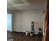 Bright living room featuring wood-look floors, a neutral color scheme, and ample natural light at 5420 Herndon Blvd, Morrow, GA 30260