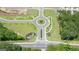 Aerial view of the community showcasing the roundabout and surrounding landscaping at 1628 Palladian Dr, Lithonia, GA 30058