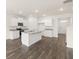Open kitchen featuring granite countertops, stainless steel appliances, and center island with sink at 1628 Palladian Dr, Lithonia, GA 30058