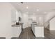Spacious kitchen featuring granite countertops, stainless steel appliances, and center island with sink at 1628 Palladian Dr, Lithonia, GA 30058
