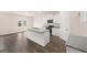 Modern kitchen featuring granite countertops, stainless steel appliances, and center island with sink at 1628 Palladian Dr, Lithonia, GA 30058