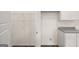 Walk-in pantry with wire shelving adjacent to kitchen area, offering ample storage space at 1628 Palladian Dr, Lithonia, GA 30058