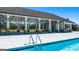 Poolside pavilion for residents, featuring ceiling fans, stone accents, and an outdoor bar area at 1628 Palladian Dr, Lithonia, GA 30058