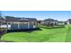 Community recreation area features a covered pavilion, pool, playground and manicured lawn at 1628 Palladian Dr, Lithonia, GA 30058