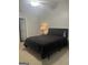 Cozy bedroom featuring plush carpet, neutral walls, and a comfortable looking bed at 3775 Highway 16 E, Sharpsburg, GA 30277