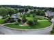 Aerial view of a neighborhood featuring a gazebo, mature trees and landscaping at 312 Relative Trl, Mcdonough, GA 30253