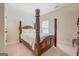Bedroom with unique four poster bed and natural light at 312 Relative Trl, Mcdonough, GA 30253