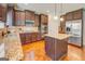 Kitchen with granite counters, stainless appliances, and island at 312 Relative Trl, Mcdonough, GA 30253