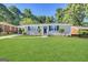 Charming single-story home with a well-manicured front yard and inviting curb appeal at 2015 Boulderview Se Dr, Atlanta, GA 30316