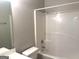 Bright bathroom featuring a shower and tub combo, toilet, and a vanity at 755 Kilkenny Cir, Lithonia, GA 30058