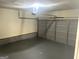 Clean garage with painted floor and garage door at 755 Kilkenny Cir, Lithonia, GA 30058