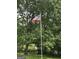 This home shows pride with an American flag displayed in the large front yard at 8440 Winston Way, Jonesboro, GA 30236