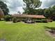 Expansive backyard includes a wooden deck that enhances this traditional home at 8440 Winston Way, Jonesboro, GA 30236