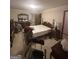 Comfortable bedroom with carpet flooring and traditional wooden furniture at 8440 Winston Way, Jonesboro, GA 30236