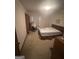 Bedroom with carpeted floor, window, and closet at 8440 Winston Way, Jonesboro, GA 30236