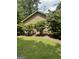 Well-maintained home has mature landscaping providing privacy at 8440 Winston Way, Jonesboro, GA 30236