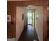 Inviting hallway with decorative light fixture and front door at 8440 Winston Way, Jonesboro, GA 30236