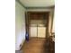 Functional laundry room with washer, dryer, cabinets and wood-look floors at 8440 Winston Way, Jonesboro, GA 30236