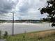 Expansive parking lot for the park or recreation area with distant buildings at 8440 Winston Way, Jonesboro, GA 30236